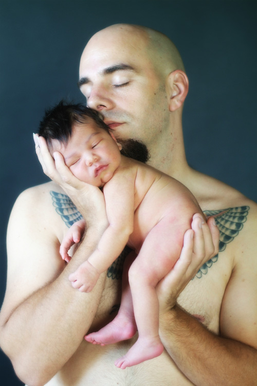 Portrait of Father and Newborn