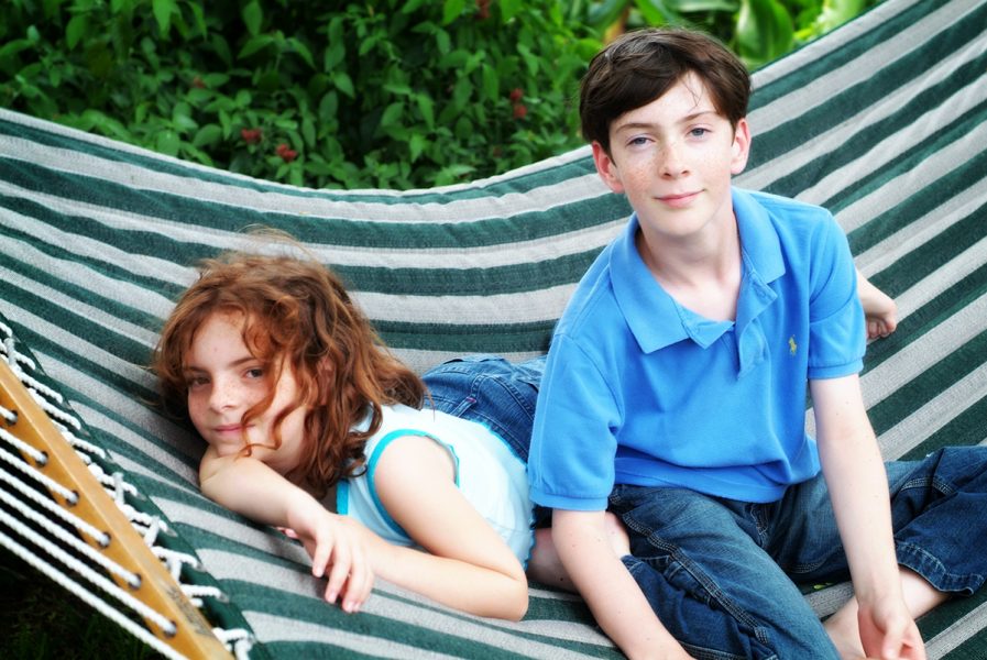 Photo Portrait of Boy and Girl Outdoors